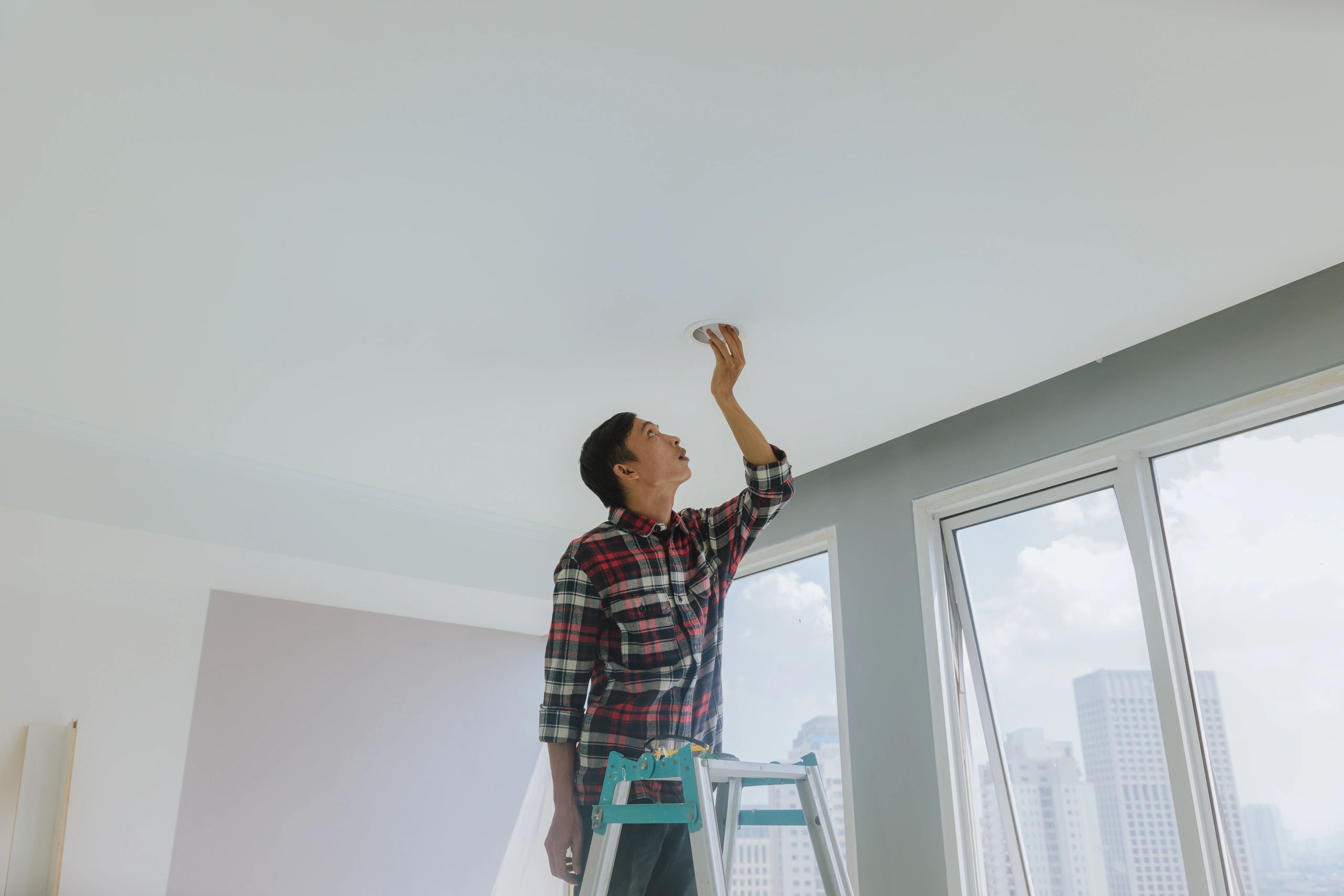 Licensed electrician performing residential electrical work