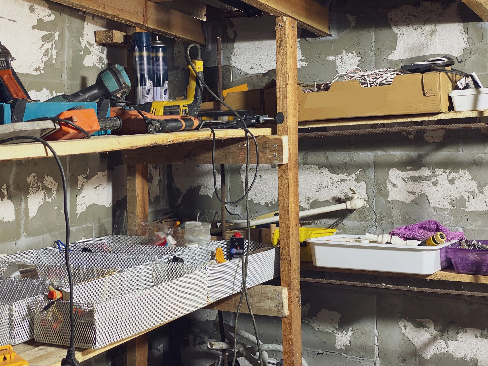Home workshop and utility area representing residential rewiring work