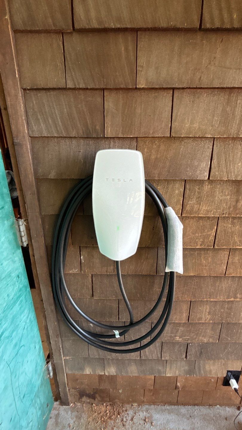 Professional electrical workspace representing EV charger installation planning